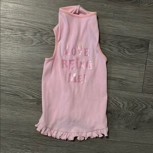 Pink Sleeveless Top with Ruffle Hem